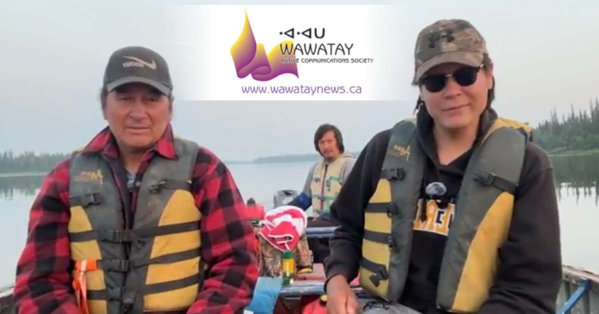 Jeronimo Kataquapit (on the right) is pictured here with his father James Kataquapit (left) and his brother Jonathan Edwards (centre) in a freighter on the Attawapiskat River as they conduct one of their daily live streams. (submitted photo)