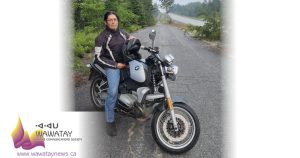 Xavier Kataquapit on his BMW motorcycle on a ride in northern Ontario.