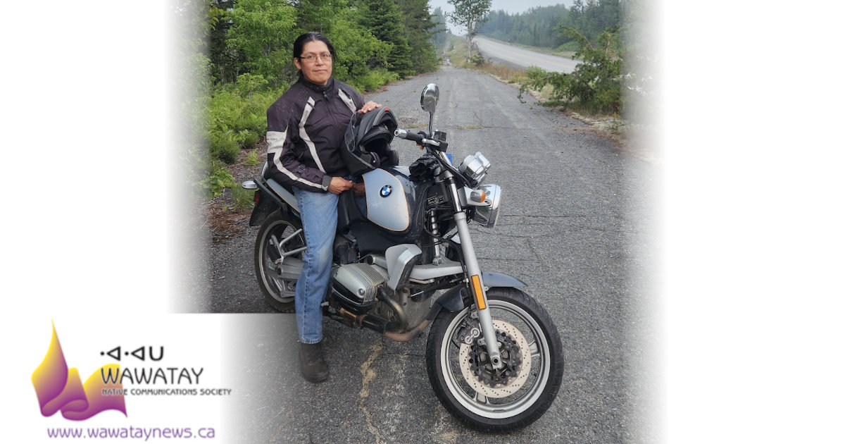 Xavier Kataquapit on his BMW motorcycle on a ride in northern Ontario.
