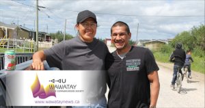 Xavier Kataquapit with his childhood friend and cousin Joey Okimaw at their home community of Attawapiskat First Nation in 2016.